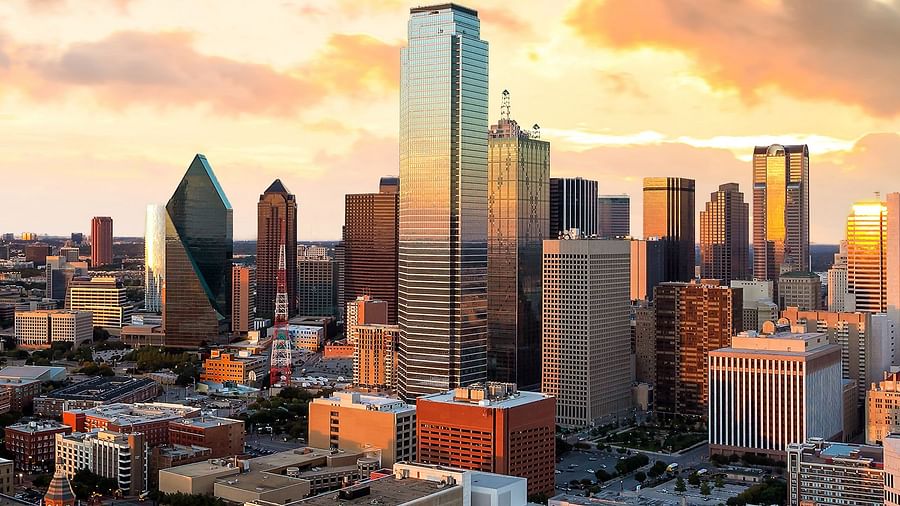 Iconic Dallas skyline bathed in the warm hues of sunset